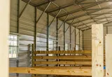 Wood stalls in horse barn