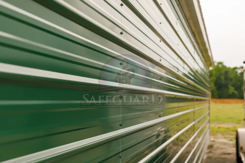 Green color screws on horse barn exterior